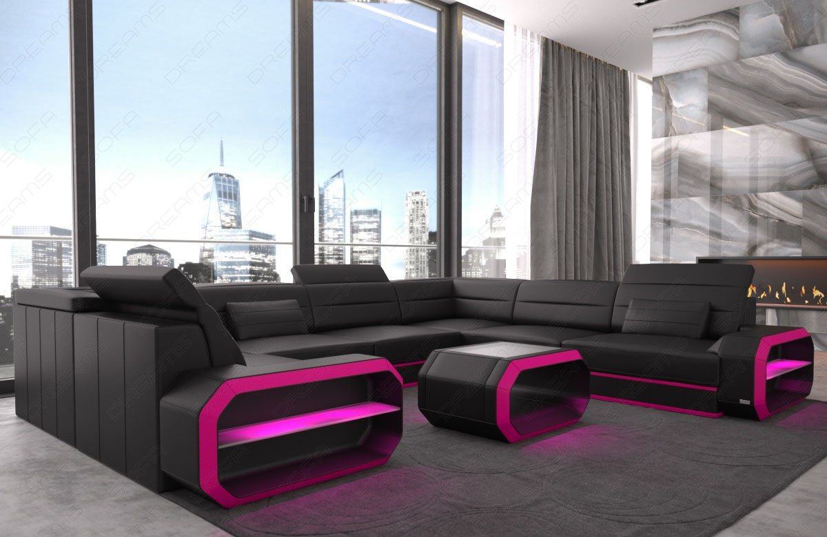 Großzügige Wohnlandschaft mit LED Beleuchtung in schwarz-pink