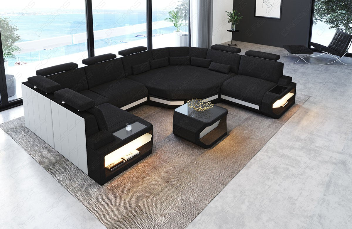 Polster Wohnlandschaft Asti U Form Mini in schwarz - Hugo14 mit Nebenfarbe weiß (Kunstleder). Couchtisch und USB Anschlüsse sind optional erhältlich.