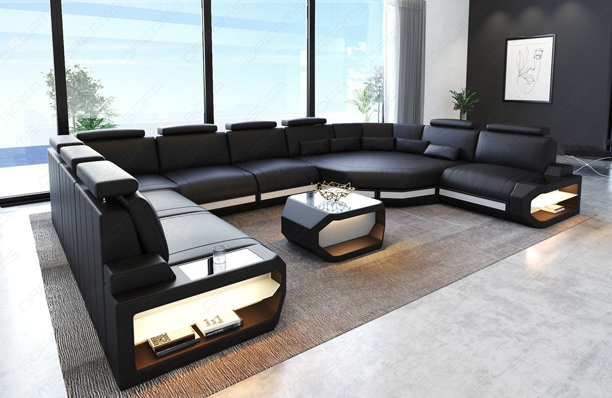 Leder Sofa Wohnlandschaft Asti U Form in schwarz-weiß. Couchtisch und USB Anschlüsse sind optional erhältlich.